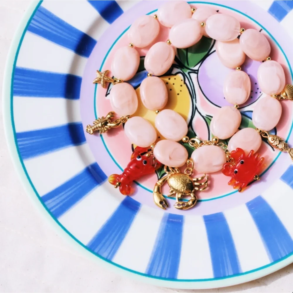 Ovale kralenketting met bedels Crabby's